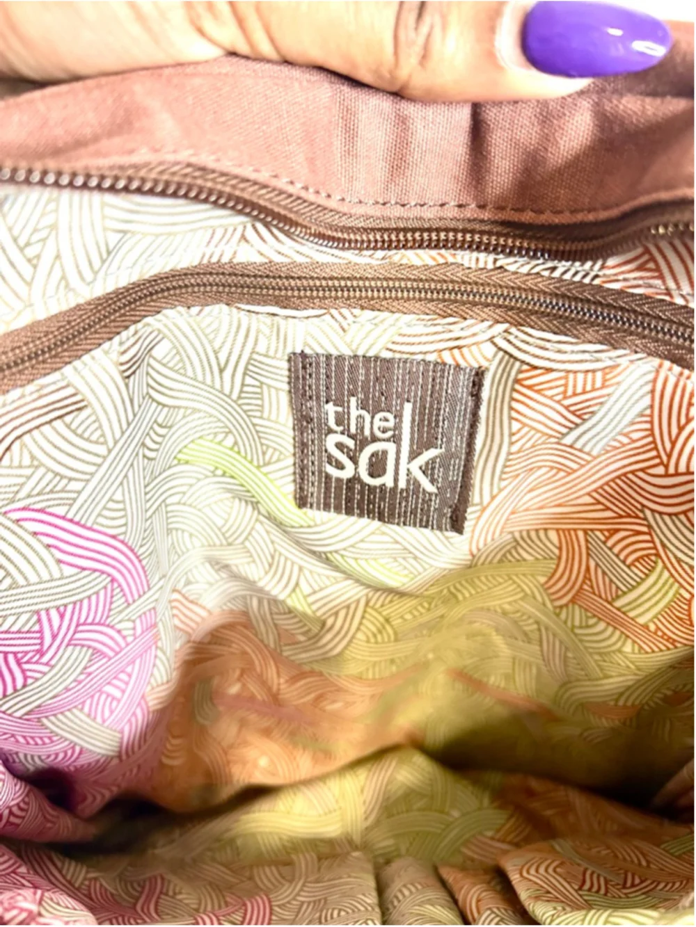 The Sak Ventura Leather Convertible Backpack in a brown, distressed leather